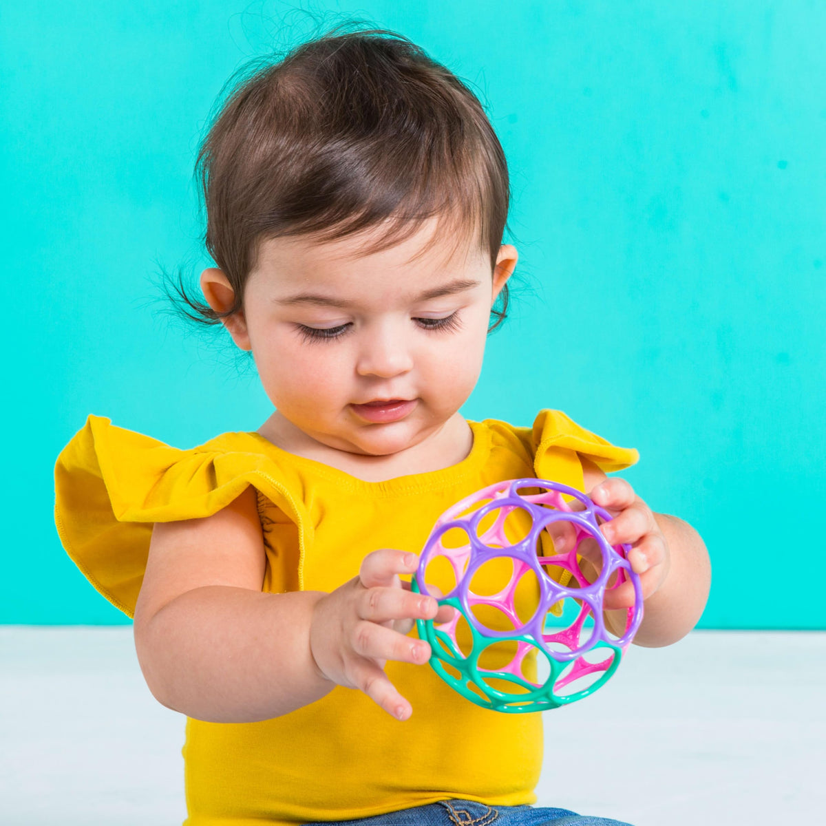 Bright Starts Oball Easy Grasp Classic Ball BPA-Free Infant Toy in Red, Yellow, Green, Blue, Age Newborn and up, 4 Inches