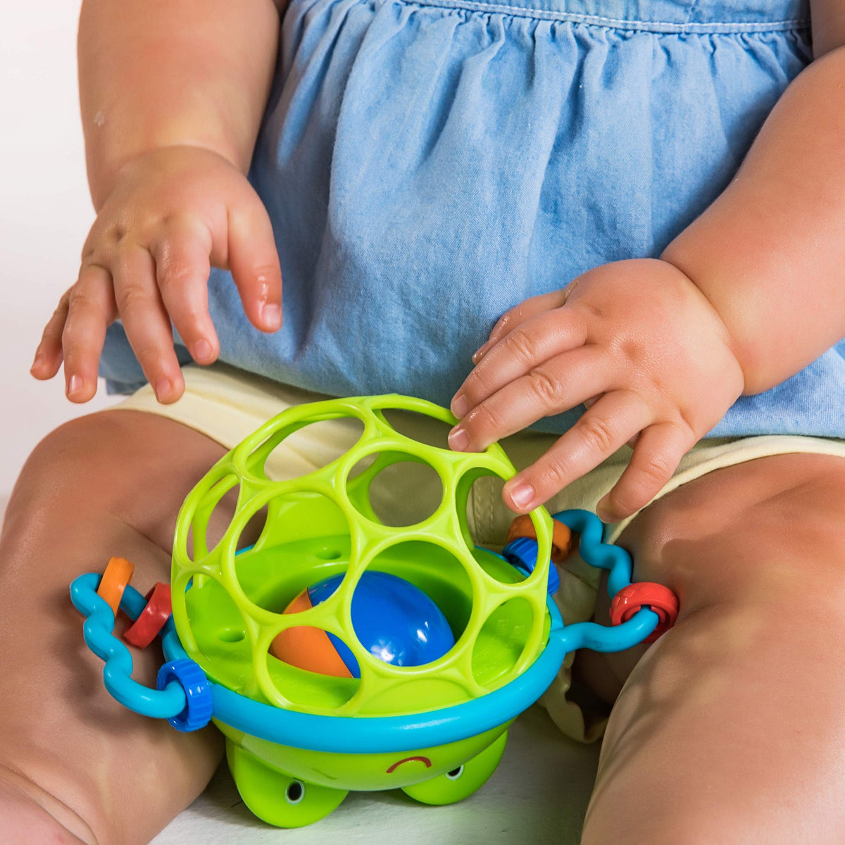 Bright Starts Oball Easy Grasp Classic Ball BPA-Free Infant Toy in Red, Yellow, Green, Blue, Age Newborn and up, 4 Inches